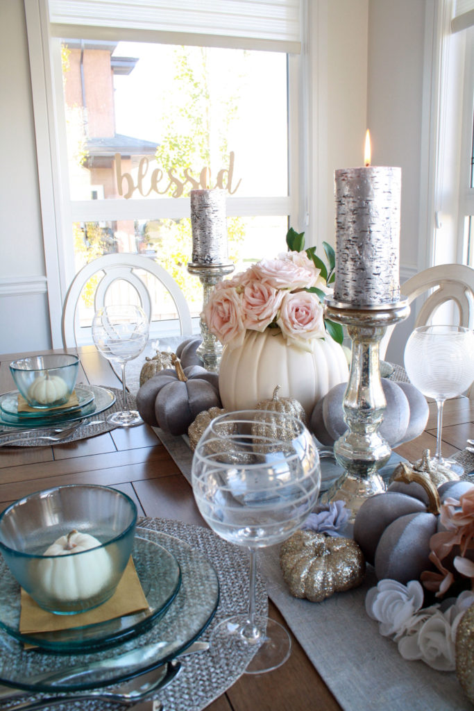 Closeup on grey and pink fall table setting