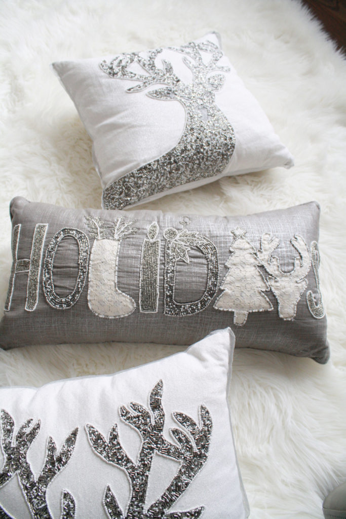 Glamorous Christmas pillows - Pier 1 Imports sparkle reindeer and sparkly Holidays pillow