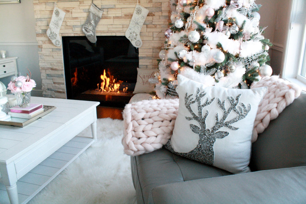 These glamorous Christmas pillows add a pop of fun to this holiday living room