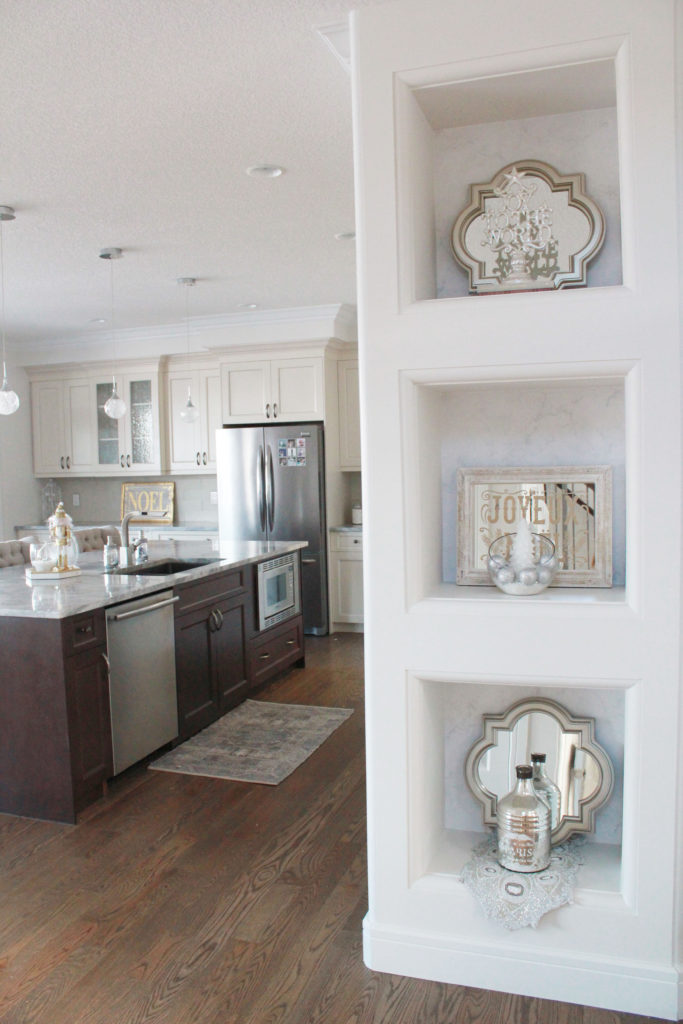 Kitchen built-in shelves with glam Christmas home decor