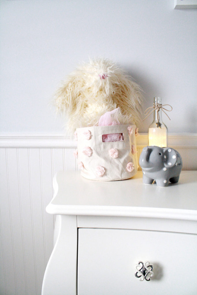 Pink and gray nursery with fuzzy Jellycat bunny