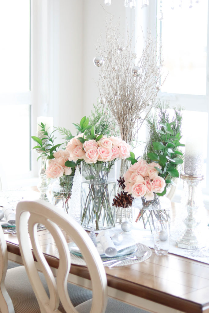 Chic Christmas Table Setting - Silver, White and Pink Glam Christmas Tablescape with Fresh Greenery on Chandeliers and Champagne