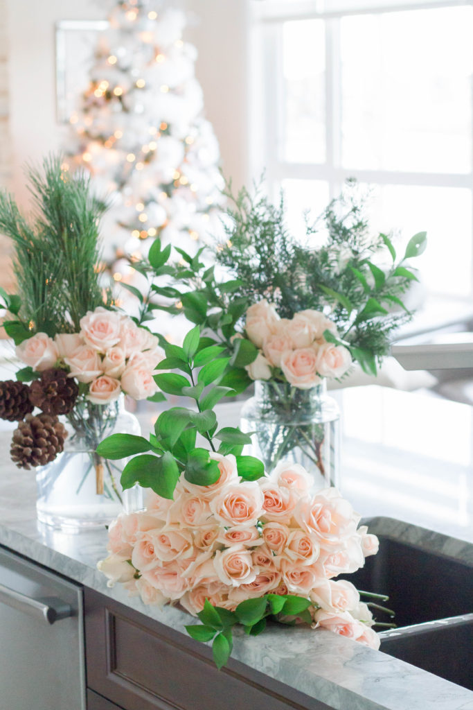 6 dozen fresh pink roses and greenery for Christmas table centrepiece 