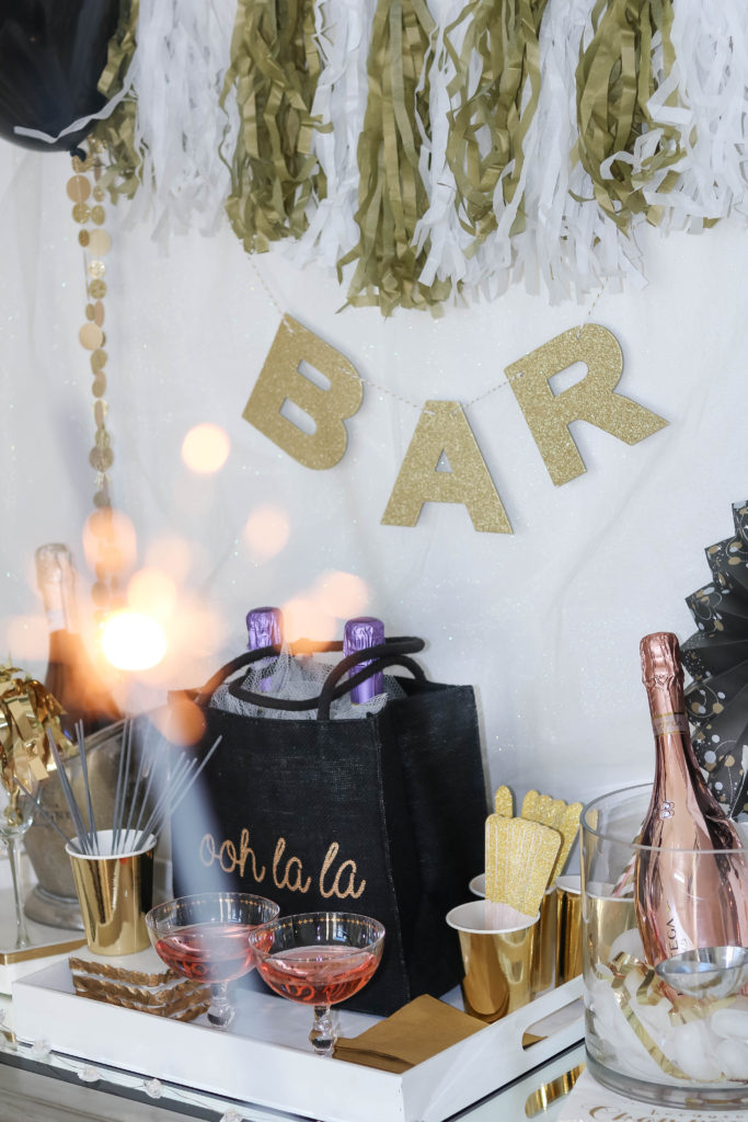 New Year's Eve bar cart styling ideas on Chandeliers and Champagne - Add some ooh la la to your New Year's Ever 2018 with a styled bar cart