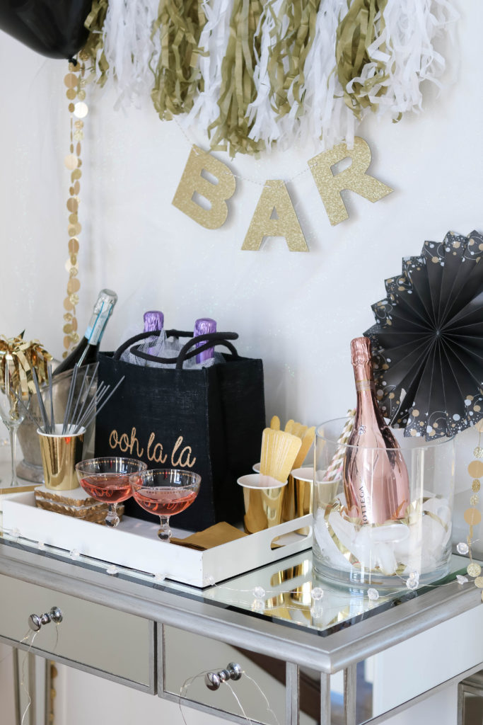 New Year's Eve bar cart styling ideas on Chandeliers and Champagne - Add some ooh la la to your New Year's Ever 2018 with a styled bar cart