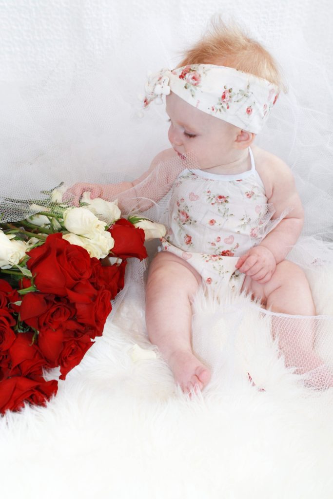The cutest Valentine's Day outfits for baby girls and toddlers - white floral romper for baby girl