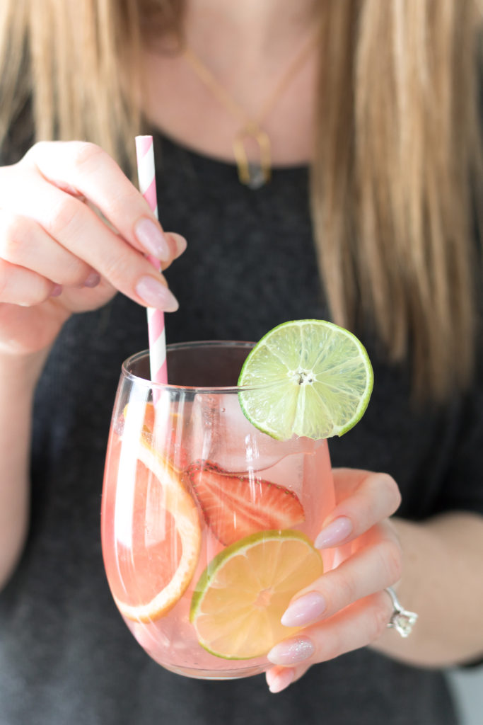 This tasty Grapefruit Rosé Sangria is beyond refreshing! One of my favourite summer cocktails. Rose Sangria. Sangria with rose and grapefruit.
