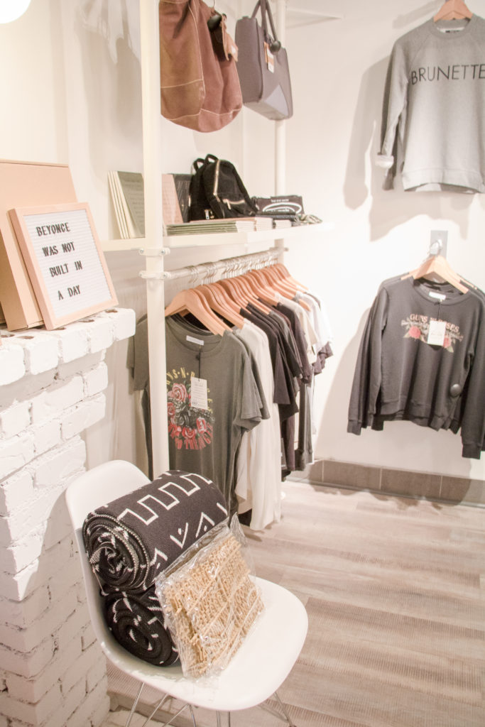 Red Ribbon Boutique in Edmonton showcasing Brunette the Label sweaters