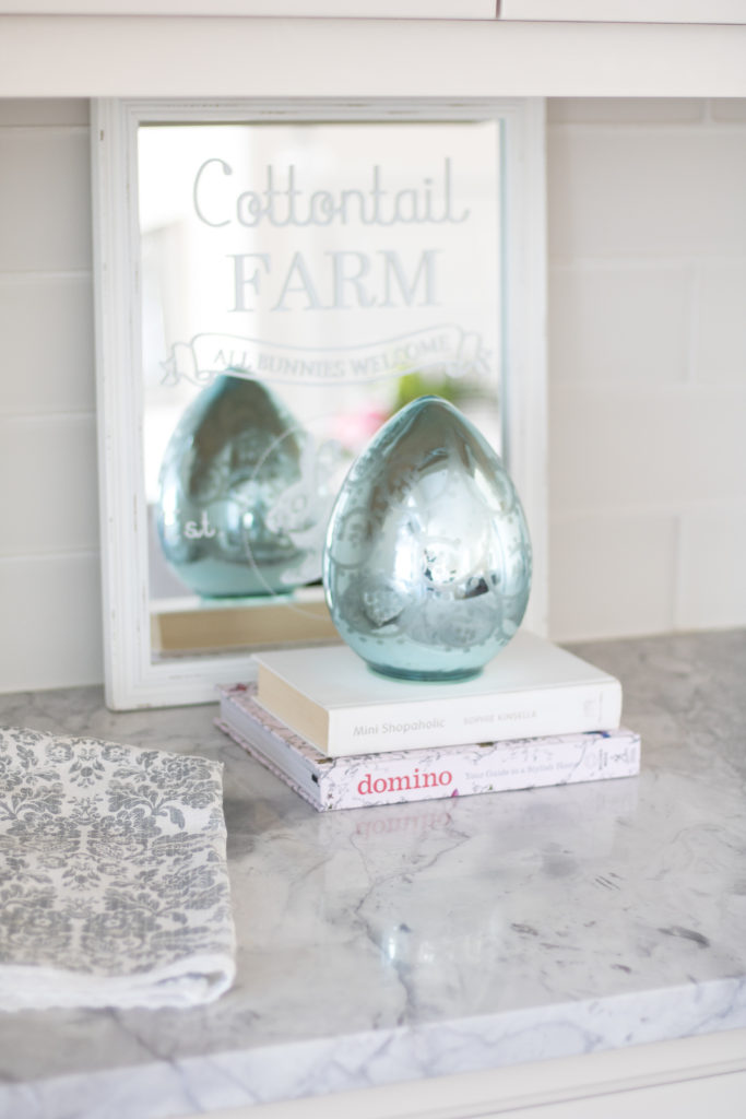 Refresh for spring with blue mercury glass Easter eggs, Cottontail Farm mirror and pastel toned books