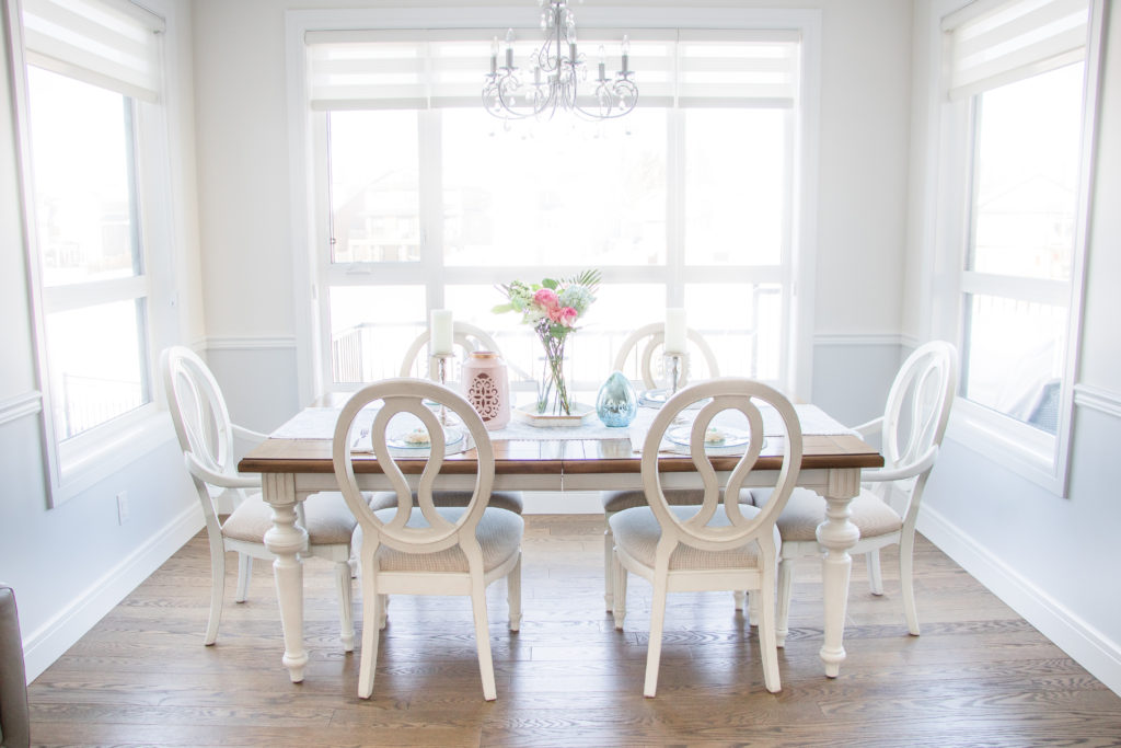 Soft natural light surrounds this spring tablescape. Refresh for spring with fresh flowers and soft pastel colours in your home. 
