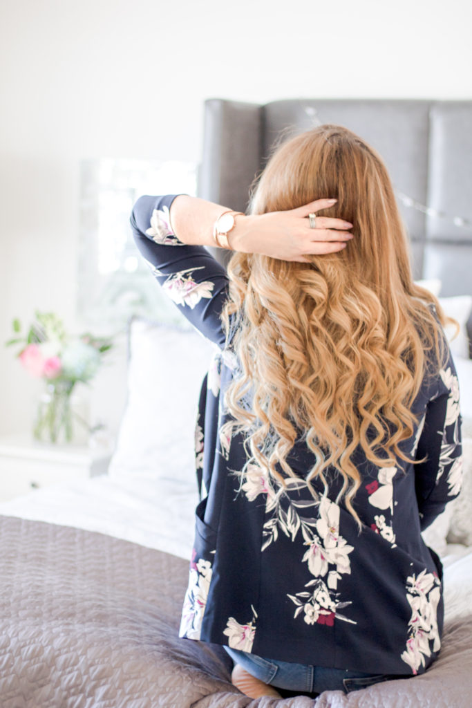 Floral blazer and freshly curled hair makes for a fun spring outfit. Closet refresh for spring on Chandeliers and Champagne. 