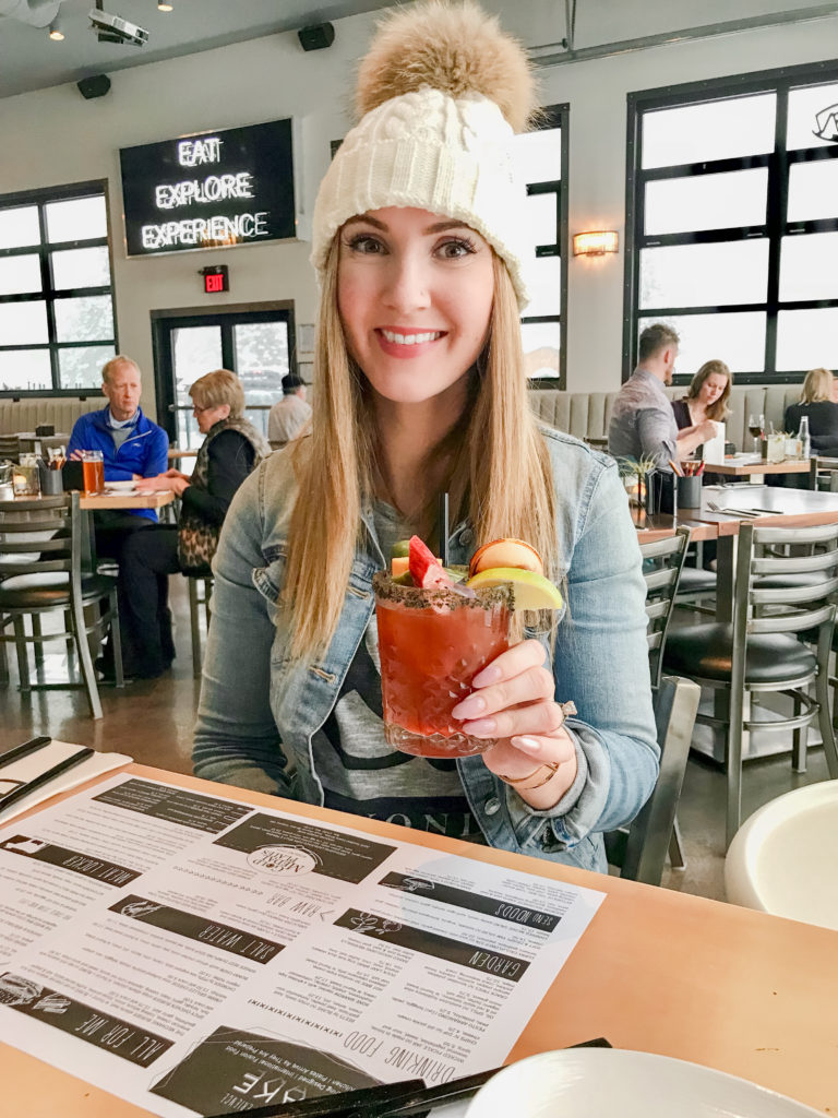 Enjoying a caesar at BLAKE Canmore during our Canmore family trip