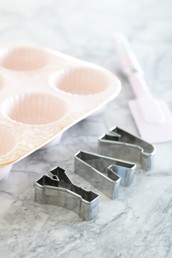 Pink kitchen accessories - Pink bakeware - Ceramic pink and gold muffin tin - YAY cookie cutters and pink spatula