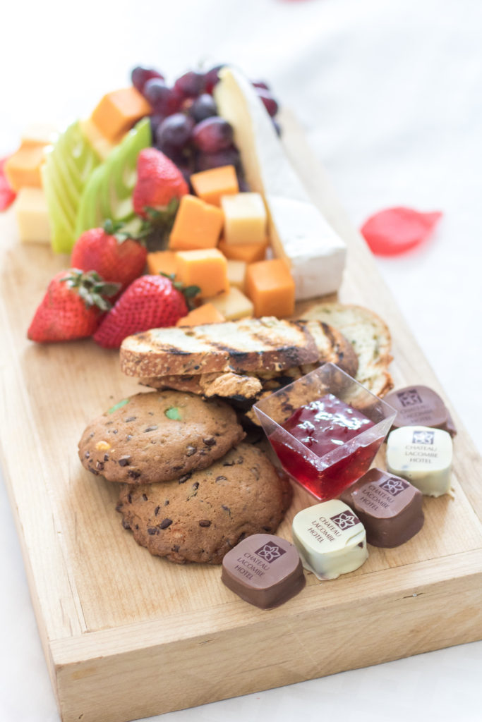 Fruit, cheese and dessert platter with personalized chocolates - Delicious food platters - Chateau Lacombe Hotel Edmonton Staycation