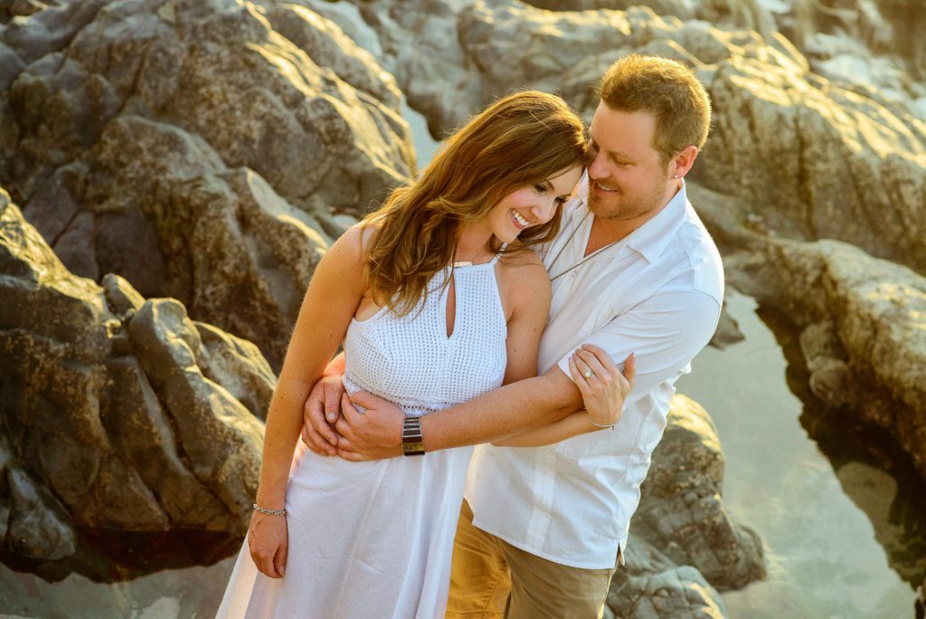 Romantic Mexico beach engagement photos - Engagement photos by a cove during golden hour in Puerto Vallarta Mexico