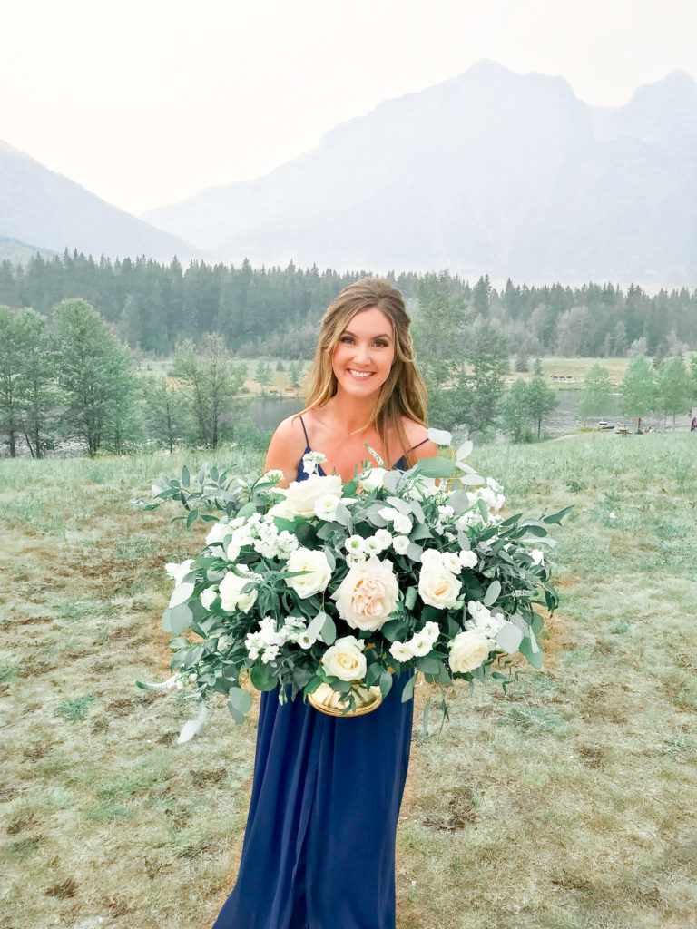 Stunning bouquet and greenery with bridesmaid - Canmore Alberta weddings - Banff Alberta weddings - Mountain weddings