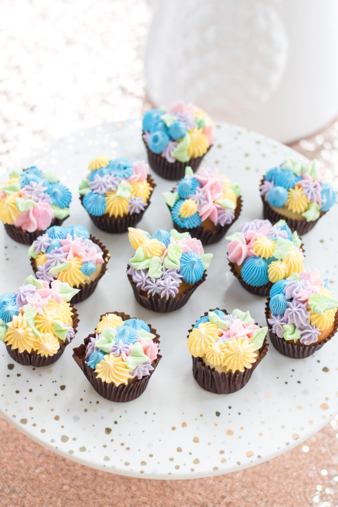 Pastel birthday party cupcakes with pastel piped flowers - Girls birthday party cupcake ideas