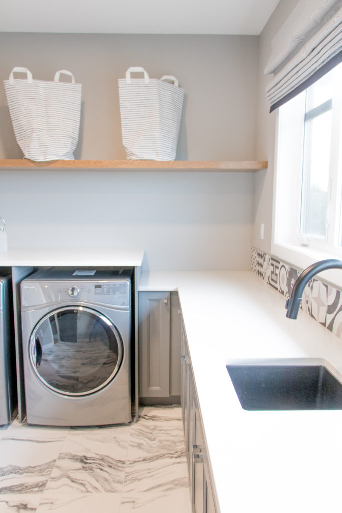 White and gray laundry room - Laundry room ideas - Marble laundry room - 2018 Edmonton DreamLife Lottery Home