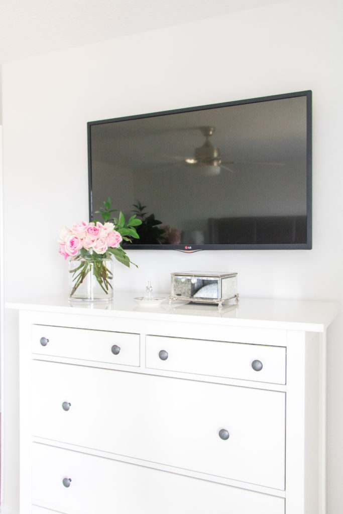 White Ikea chest of drawers in a bright and cozy master bedroom - gray, white and pink bedroom ideas