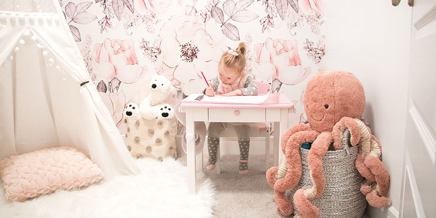 Glamorous pink playroom with white, pink and gray. Girly decor for kids - girly bedroom ideas. Peony peel and stick wallpaper.