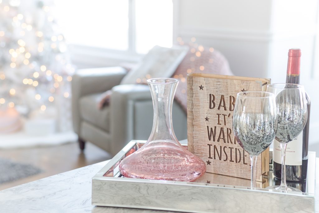 Pastel Christmas decor, pastel Christmas barware with pink shimmer decanter and gray shimmer wine glasses from Urban Barn