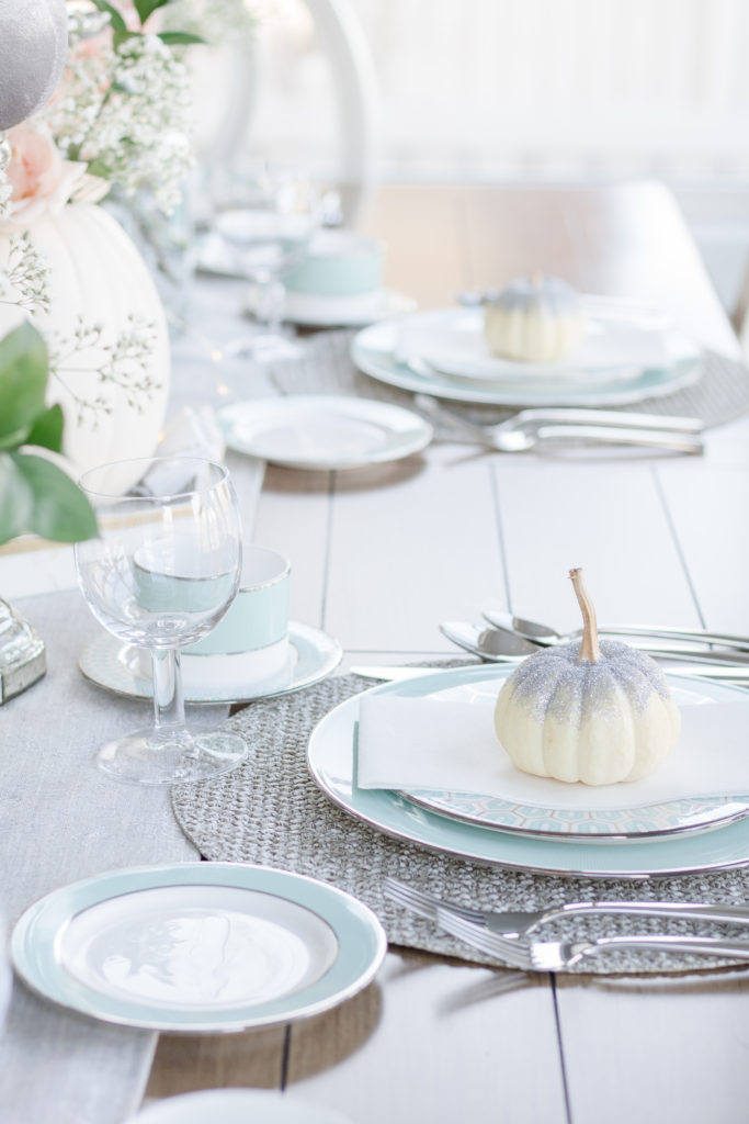 White ghost pumpkins as decor in blush pink and aqua fall tablescape - Pink and aqua Thanksgiving table setting - Fall table decor