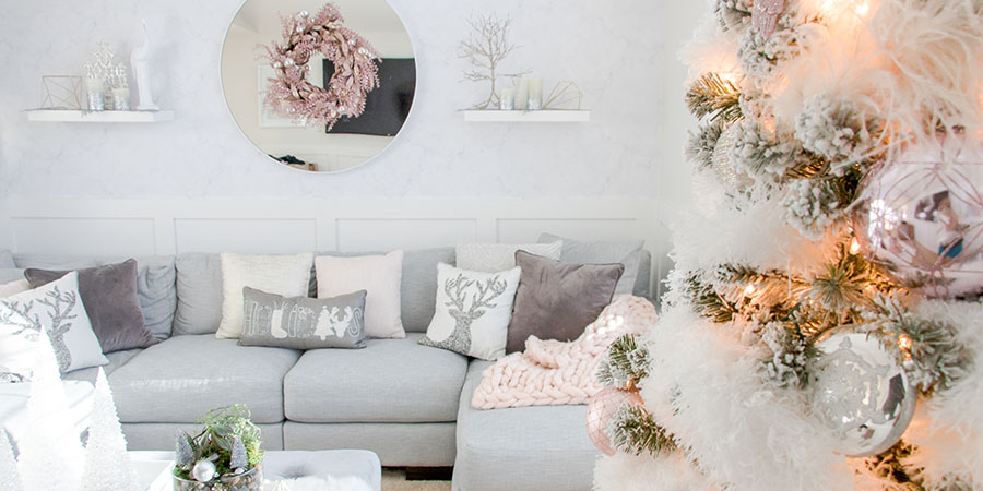 White feathered fluffy Christmas tree garland and grey-tone and pastel Christmas living room decor