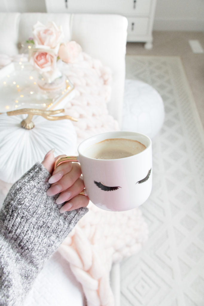 Eyelash coffee mug, pink merino blanket and neutral rug: the dreamiest, luxurious master bedroom refresh