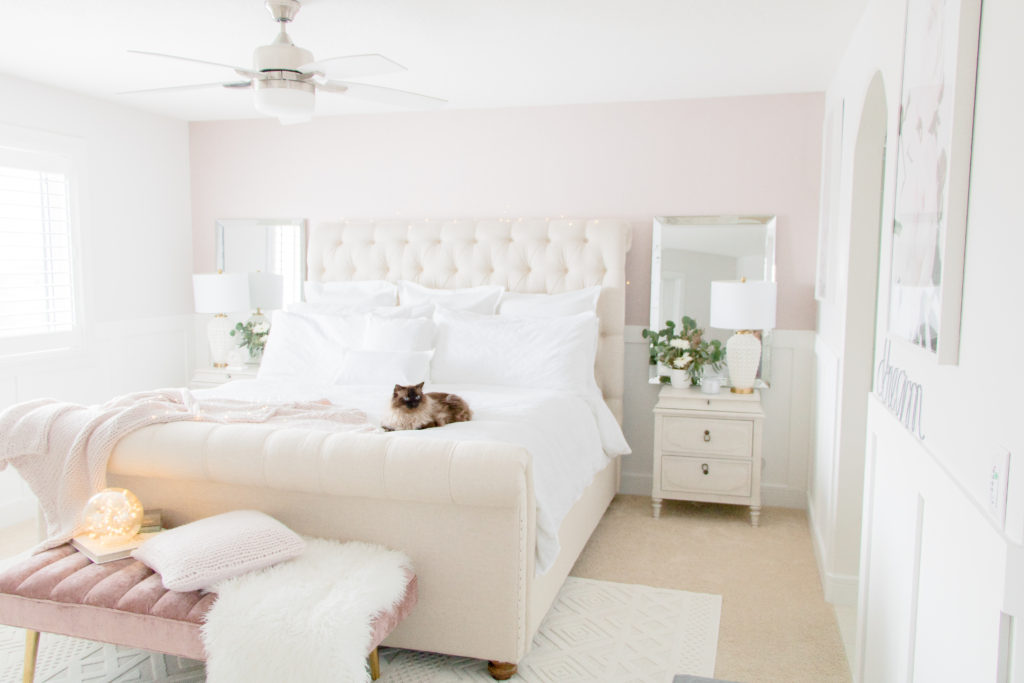 Blush pink and white luxurious master bedroom refresh with neutral furniture and blush pink pops of colour