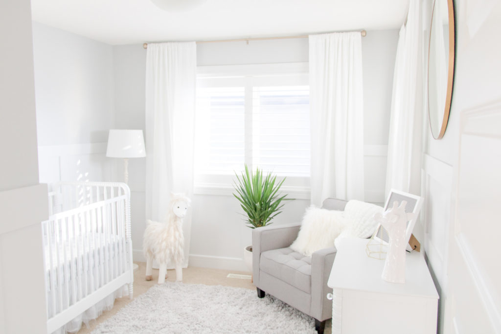 Full room view of white and grey gender-neutral nursery - Light and bright gray nursery inspiration with llama 
