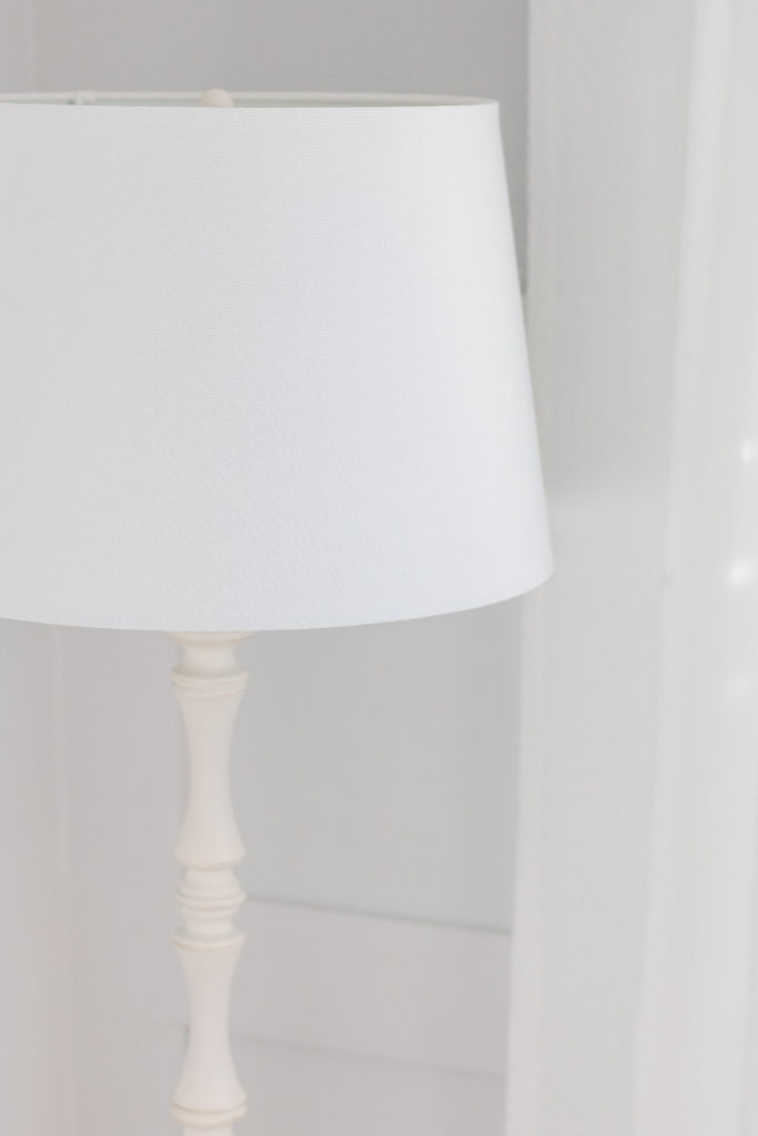Antique finish white standing lamp - White and grey gender-neutral nursery inspiration
