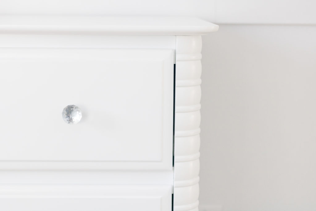 White nursery dresser with crystal knobs - White and grey gender-neutral nursery inspiration