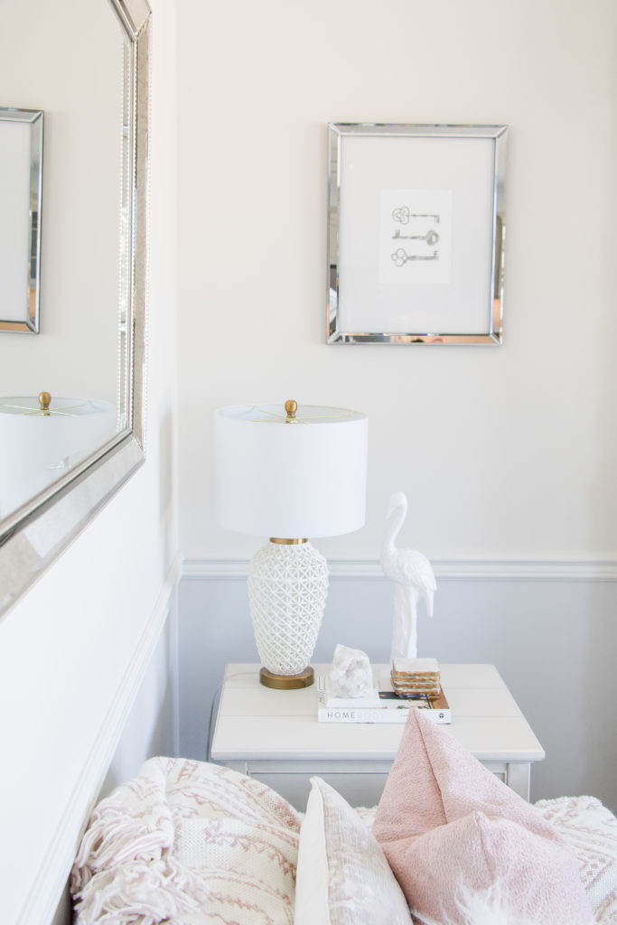 Side table styled with white and gold lamp and accessories: Pastel Living Room Decor for Spring