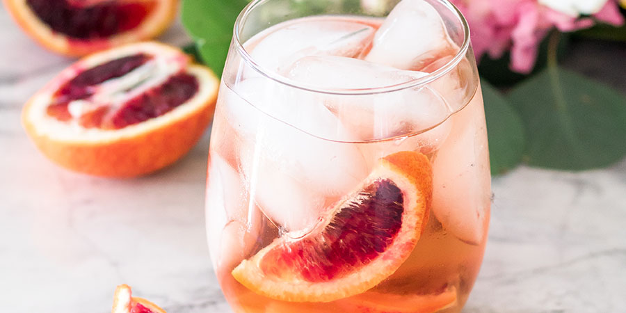 Glass of blood orange sangria with Moscato