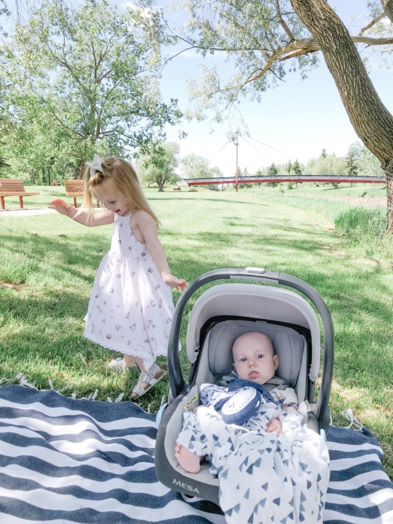 UPPAbaby MESA infant car seat at park for picnic