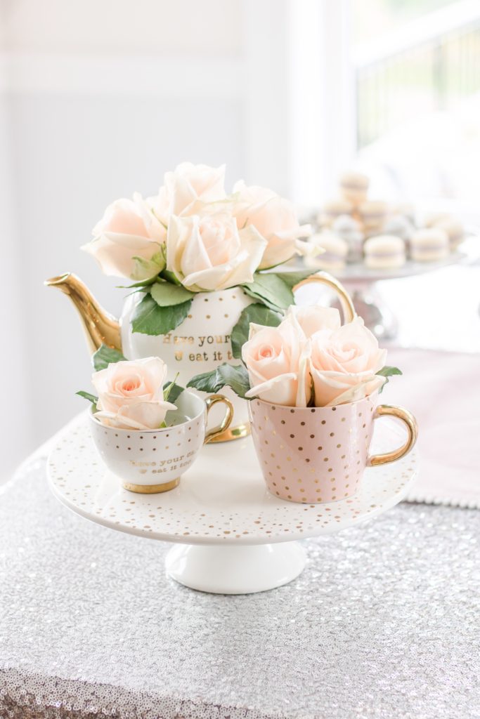 Pink roses styled in tea cups and tea pot for Birthday Tea Party