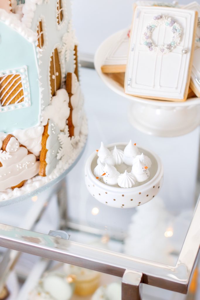 Snowman meringues on Christmas dessert cart