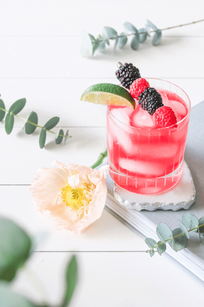 Cute AF Pink Valentine’s Day Cocktails : Cherry Gin and Tonic with flowers and eucalyptus