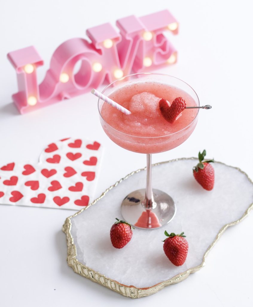 Overhead shot of Strawberry Lemonade Frosé with pink love sign