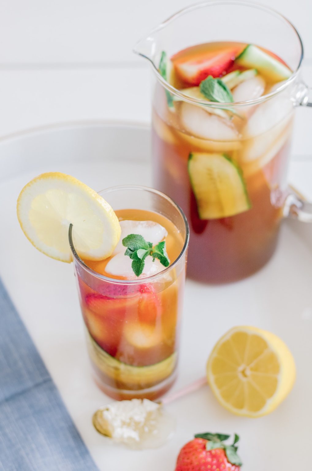 Pimm’s Iced Tea Recipe • Refreshing Pimm's cocktail • Chandeliers and ...