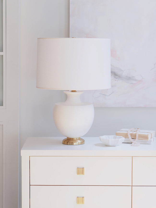 Sculpted white and gold lamp