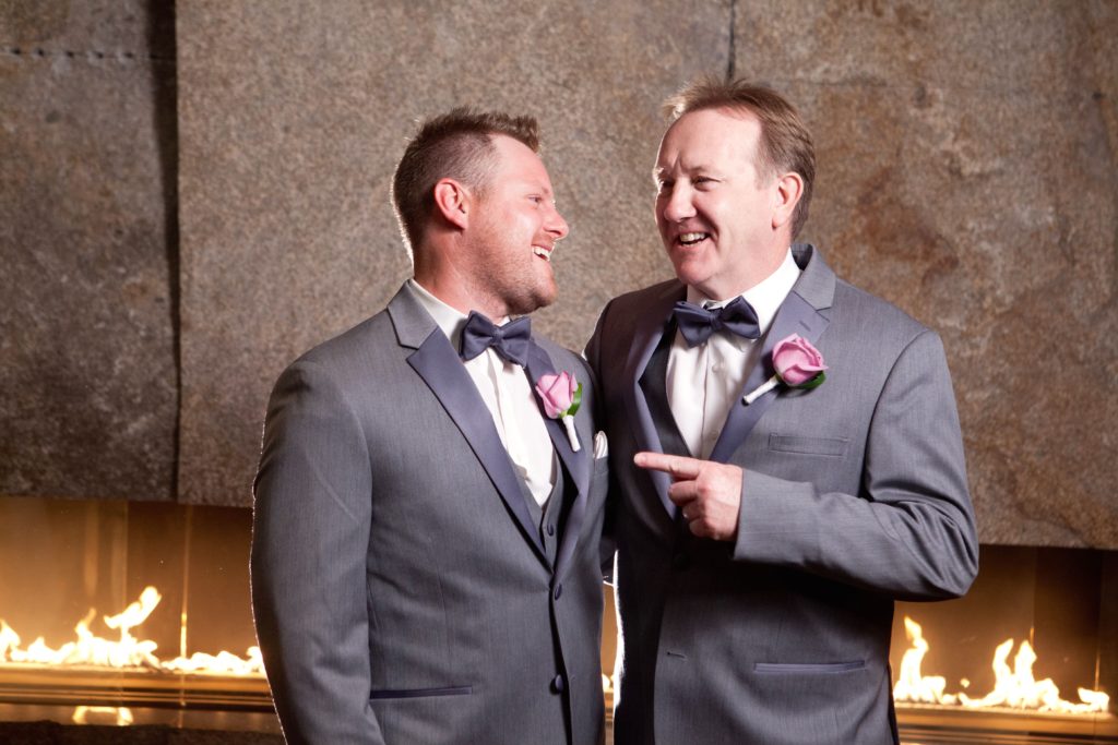 Groom and father of the bride photo