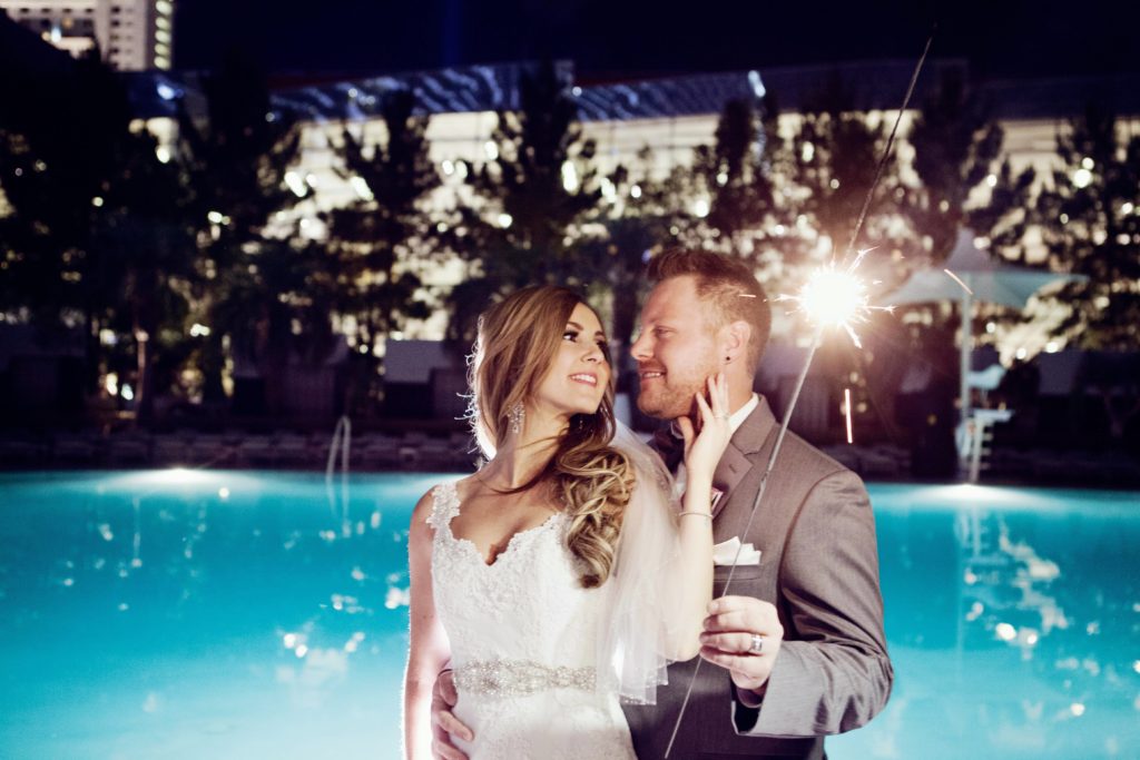 Bride and groom with sparkler at Las Vegas wedding