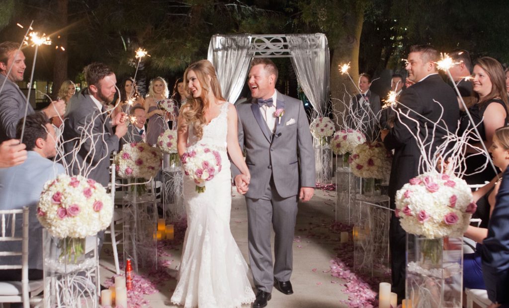 Sparklers at twilight Las Vegas wedding