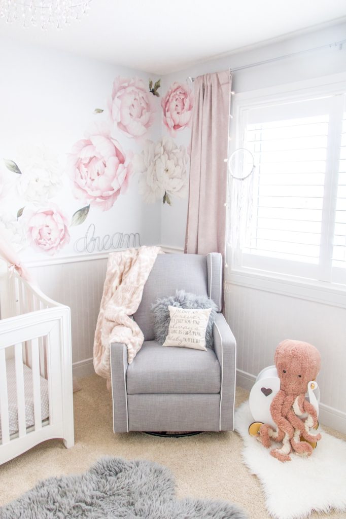 Pink peony nursery : cute corner of nursery with pink peony wall decals, pink drapes and gray glider recliner 