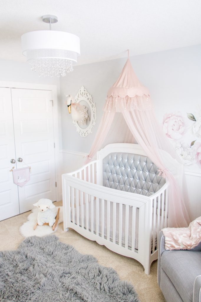Girls' swan nursery with pink and gray nursery decor