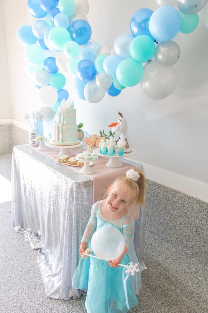 Little Princess Elsa enjoying her Frozen birthday party