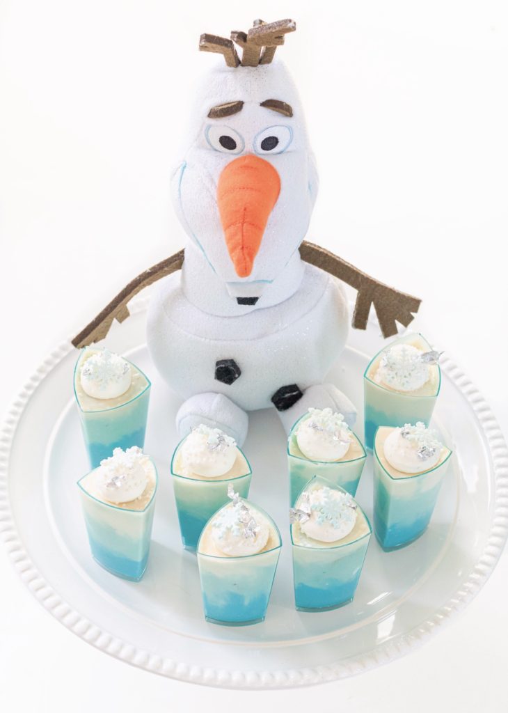 Olaf with Frozen birthday party desserts: ombre cheesecakes
