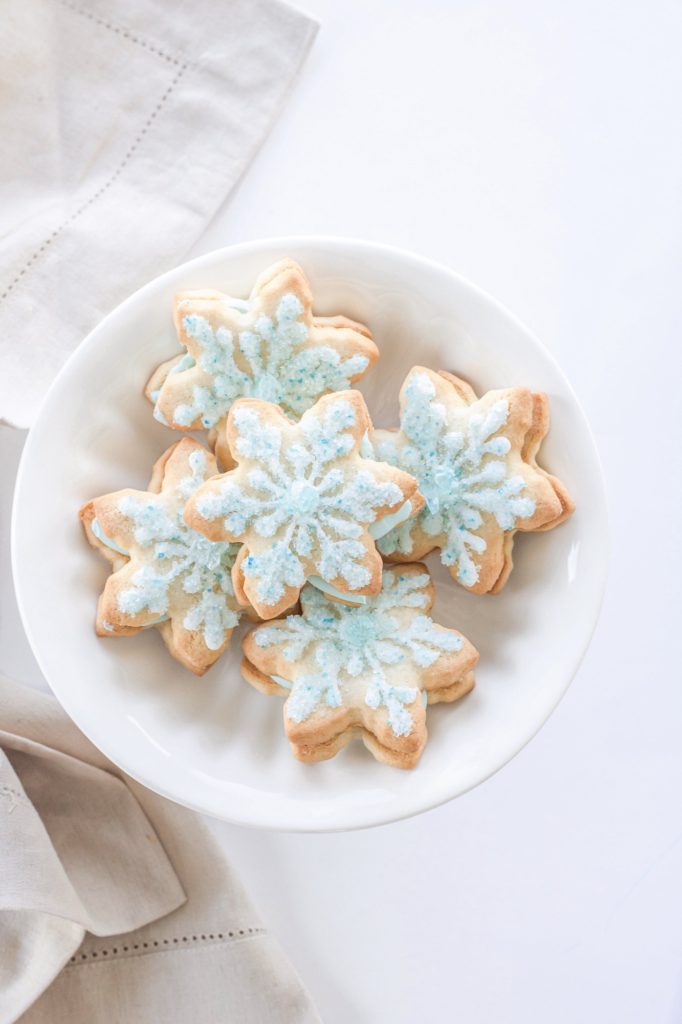 Snowflake cookie sandwiches perfect for Elsa-themed Frozen birthday party