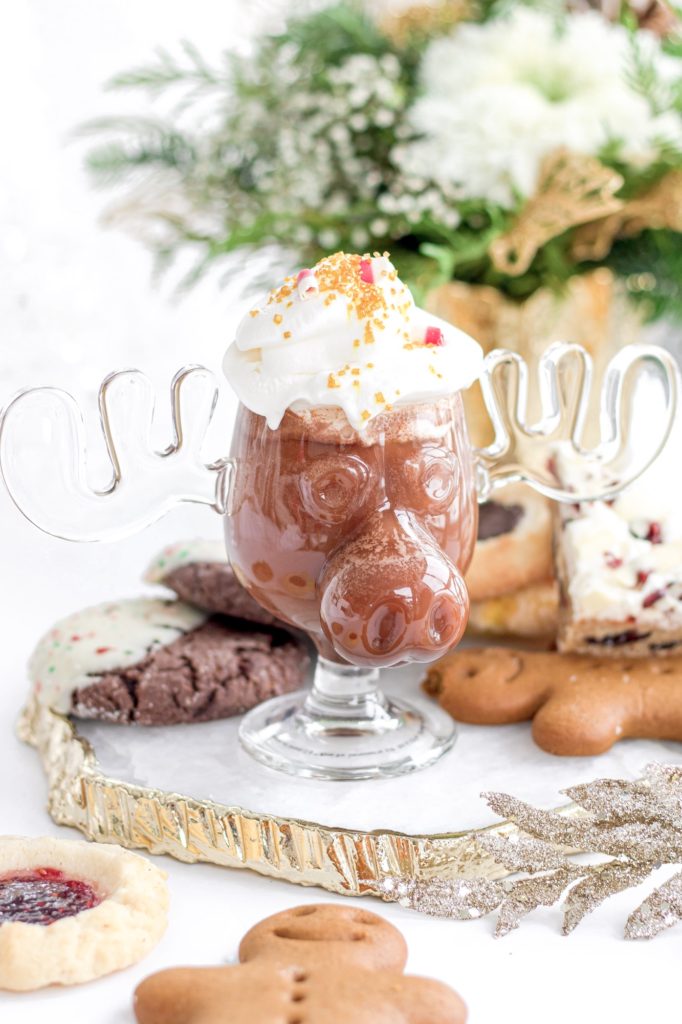 Hot cocoa with whipped cream dripping